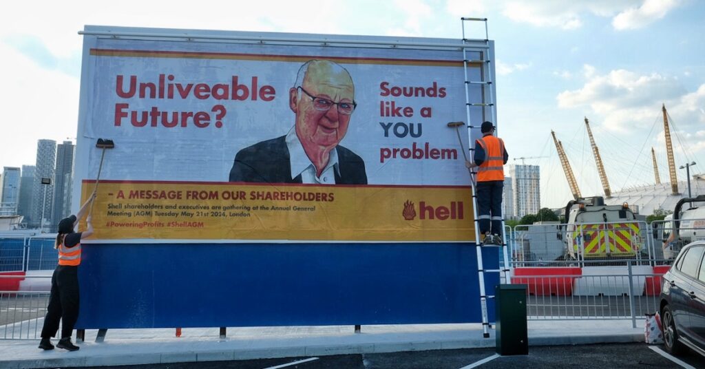 Activists install a billboard featuring an older, bald man with the slogan "Unlivable aFuture. That sounds like a you problem.'